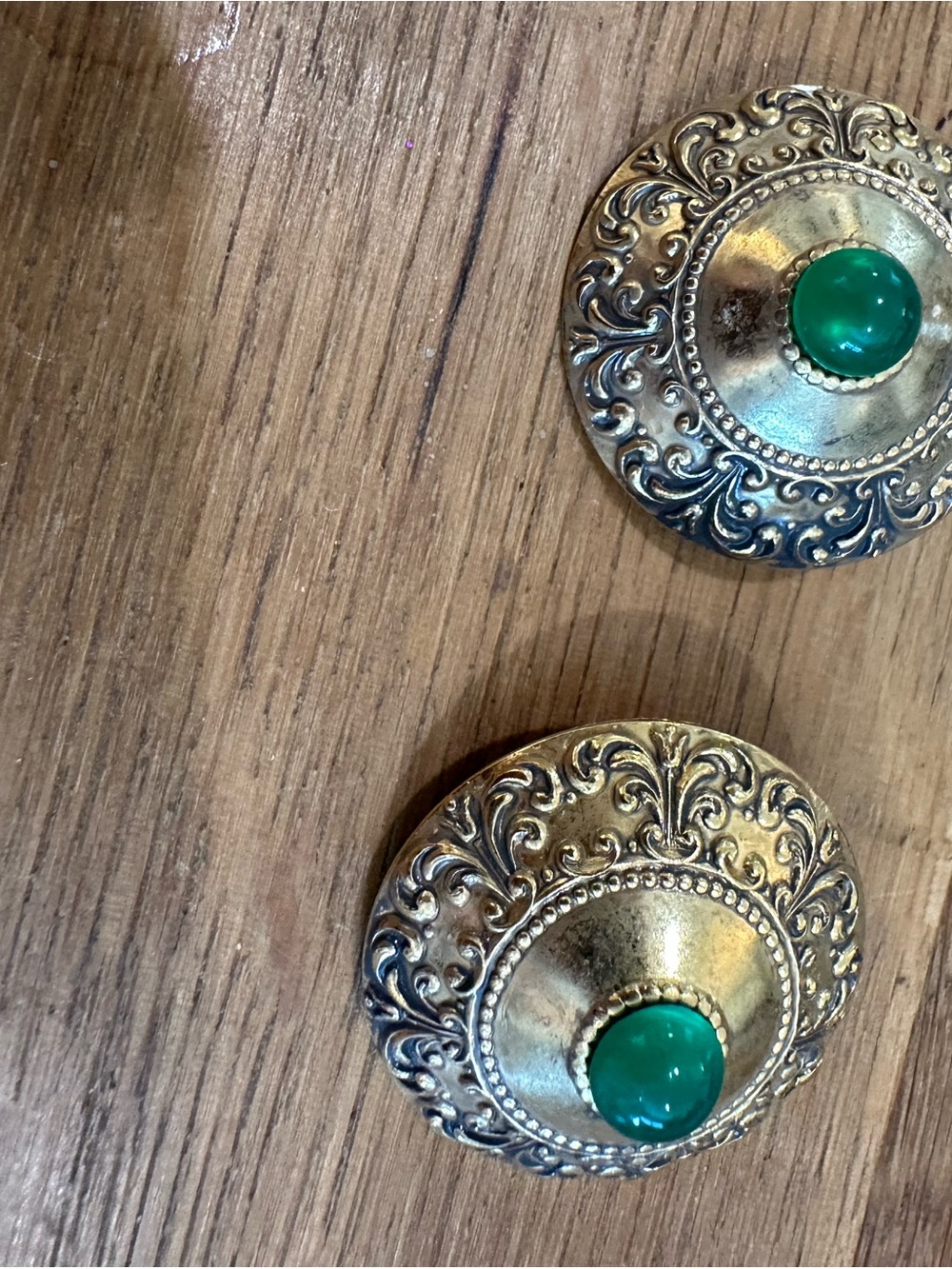 Ornate Brass-Tone Earrings with Green Gem Accent